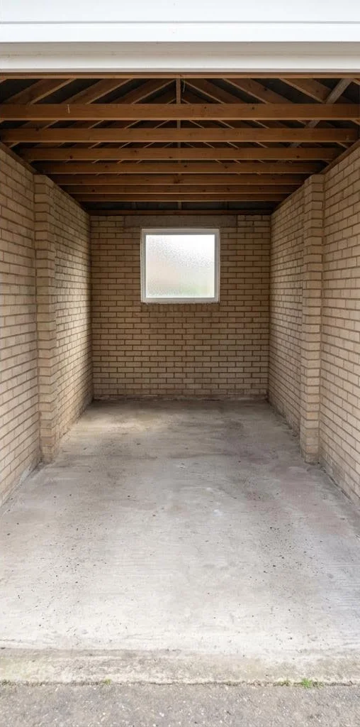 Illustrative garage clearance after: loose clutter removed from the same garage